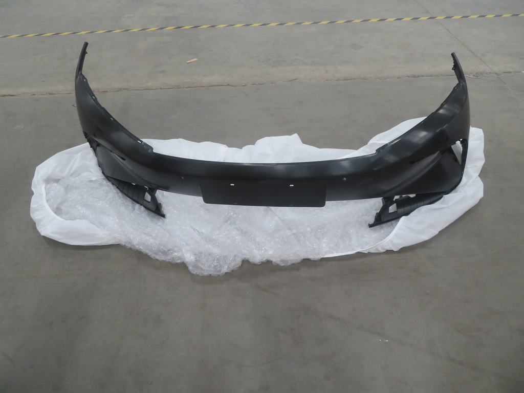 Front bumper body unpainted ·